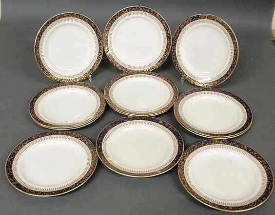 Appraisal: Set of twelve service plates with gilt and blue borders