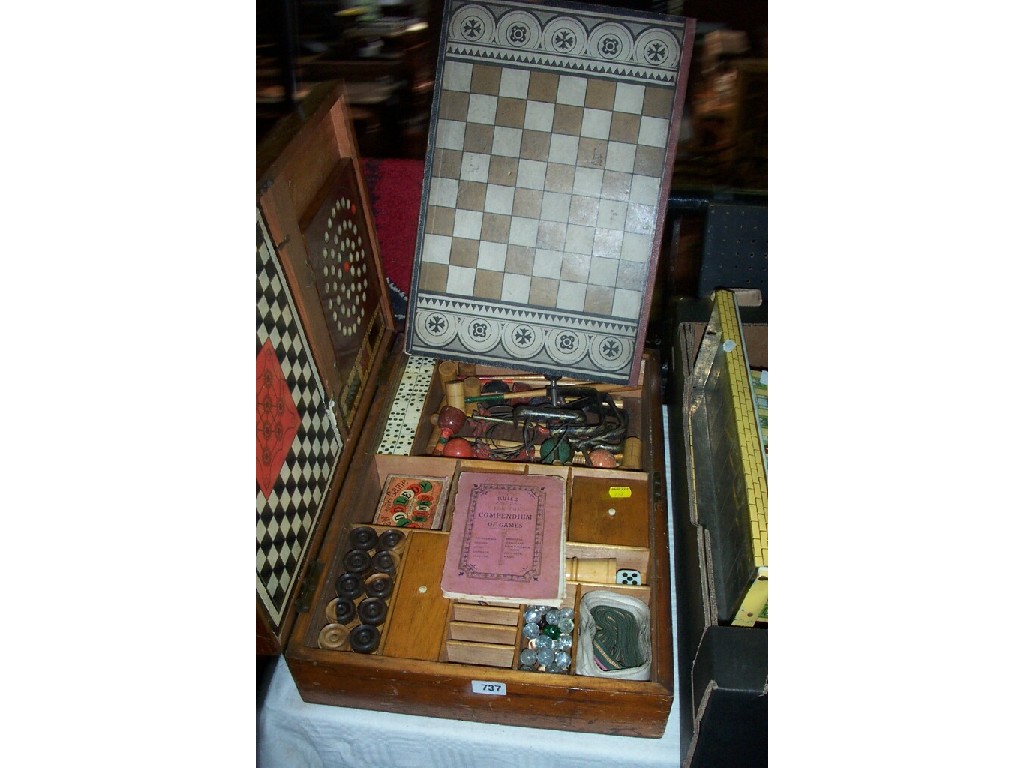 Appraisal: A th century wooden case containing a comprehensively fitted games