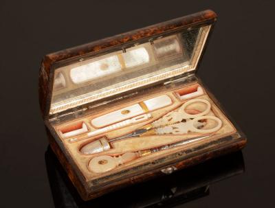 Appraisal: A Palais Royal sewing kit cased in a burr yew