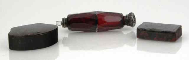 Appraisal: A red glass double ended scent bottle and two papier-m