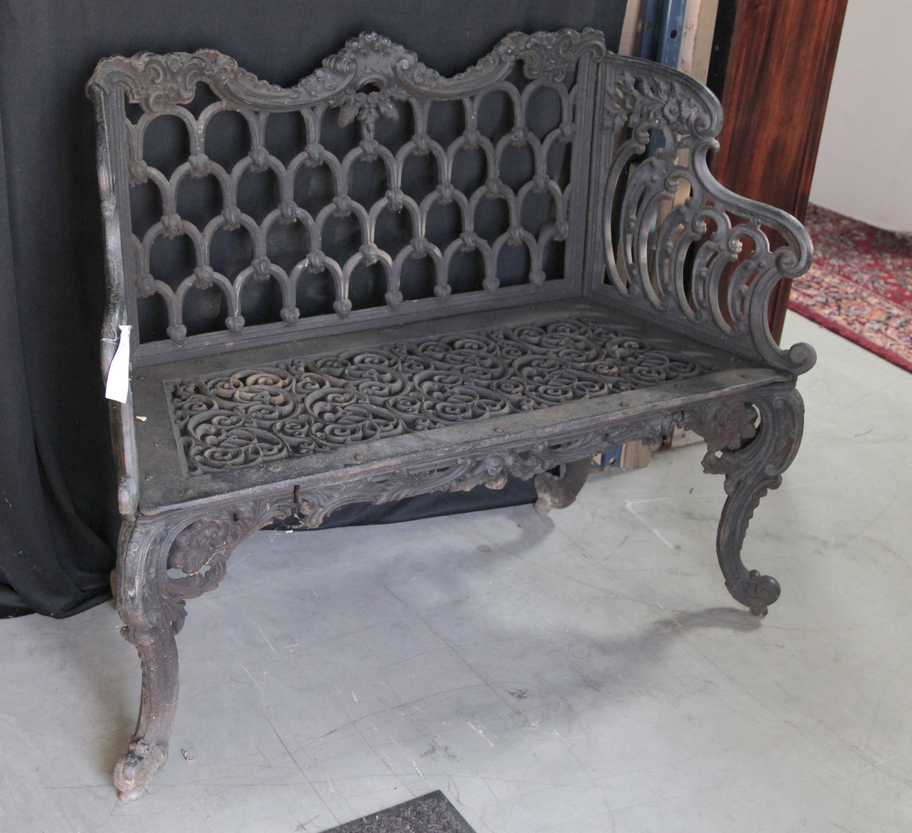 Appraisal: CAST IRON GARDEN BENCH American early th century Openwork bench