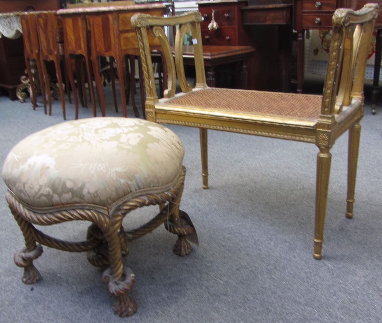 Appraisal: A gilt framed footstool after Fournier with knotted rope twist