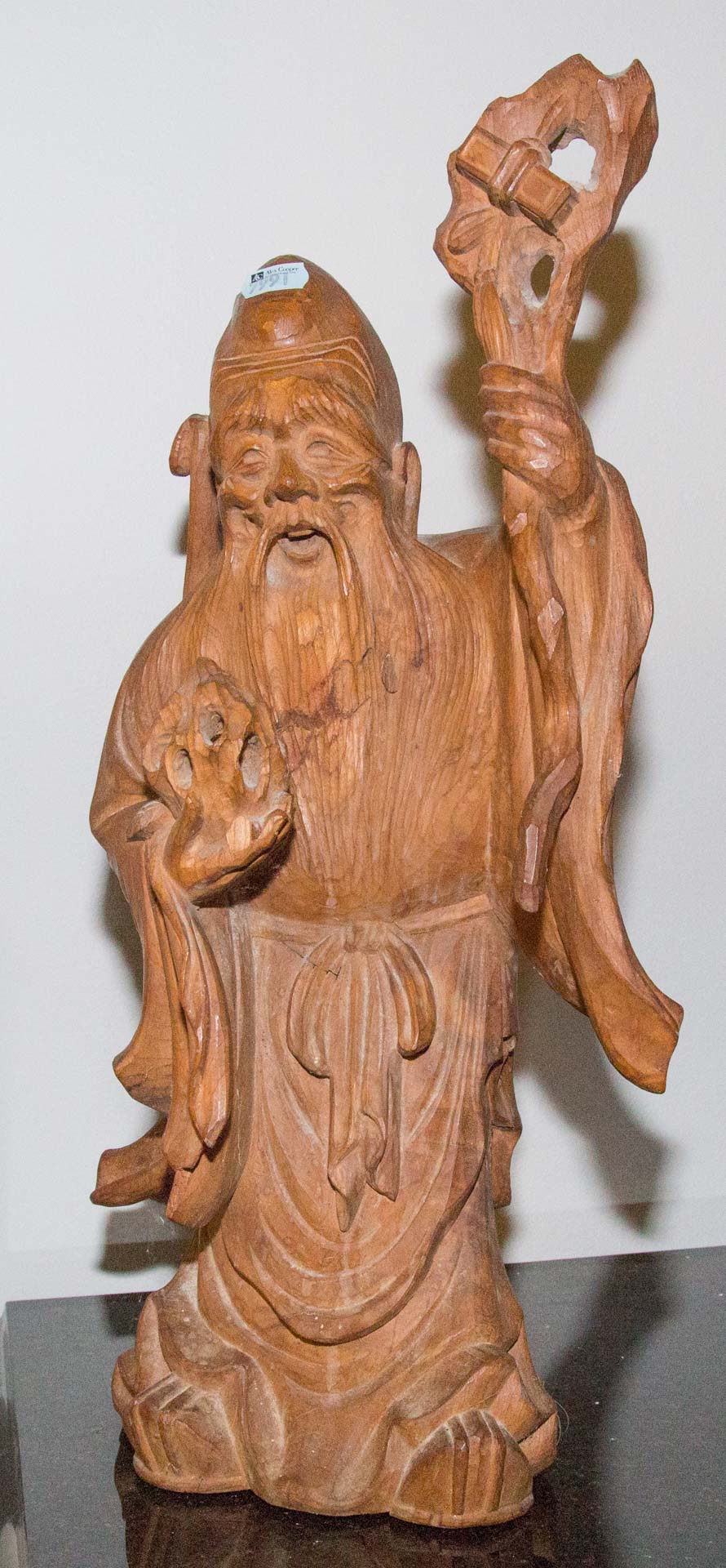 Appraisal: Carved wood oriental figure