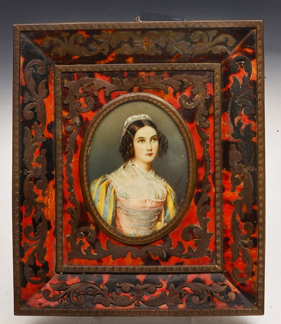 Appraisal: A FRENCH MINIATURE PAINTED BUST LENGTH PORTRAIT of a young