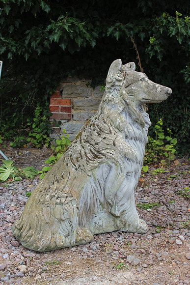 Appraisal: A CAST RECONSTITUTED STONE SCULPTURE of a Collie dog cm