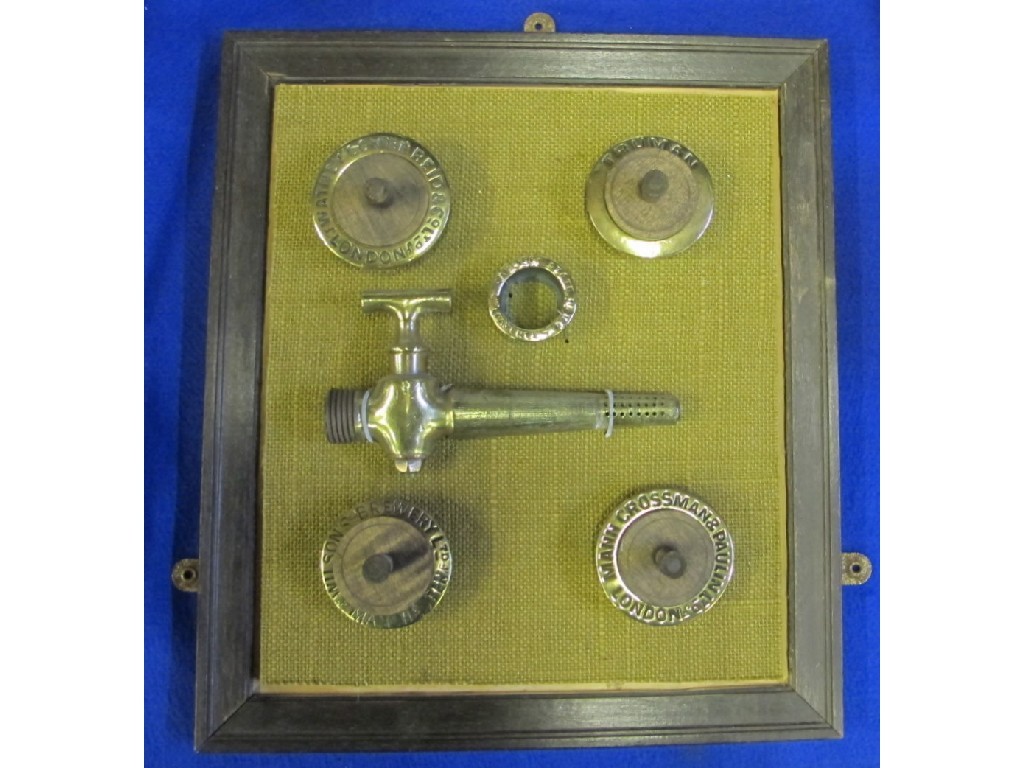 Appraisal: Framed and mounted brass casket tap and five brass barrel