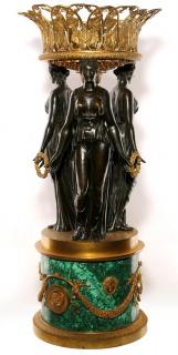 Appraisal: AN EMPIRE STYLE FIGURAL BRONZE MALACHITE CENTERPIECE An Empire revival