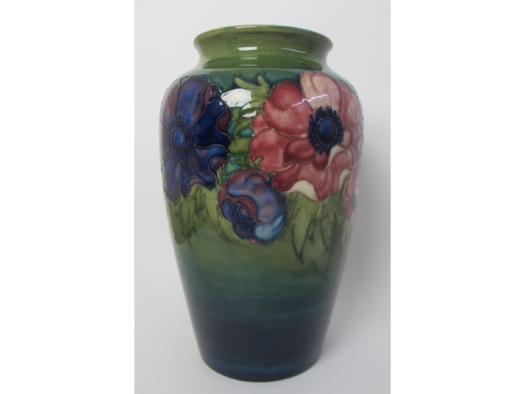 Appraisal: A Moorcroft Anemone pattern vase with pink and blue flowers