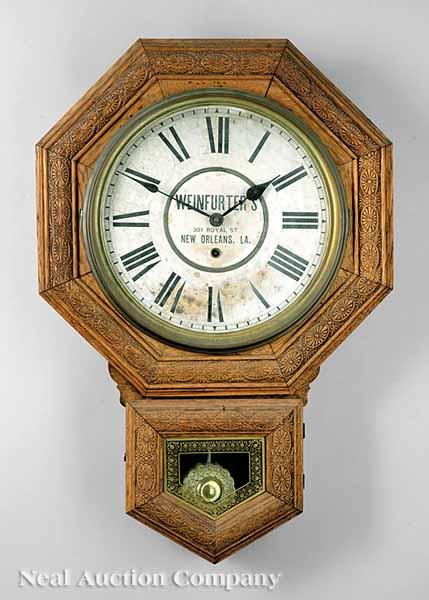 Appraisal: A New Orleans Golden Oak Advertising Wall Clock c the