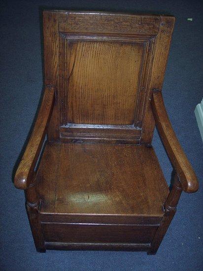 Appraisal: A th Century oak wainscot chair the rectangular panel back