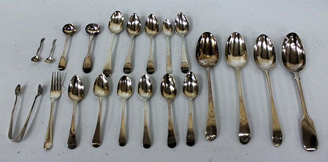 Appraisal: A PAIR OF GEORGIAN SILVER TABLESPOONS eleven antique silver teaspoons