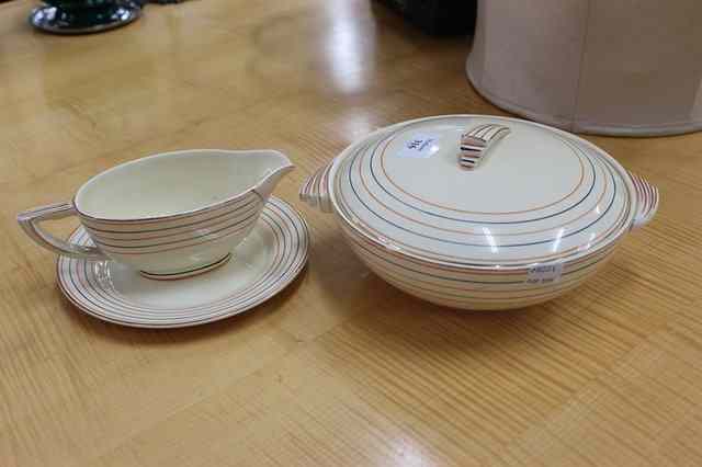 Appraisal: A WEDGWOOD ART DECO CREAM WARE DINNER SERVICE with orange