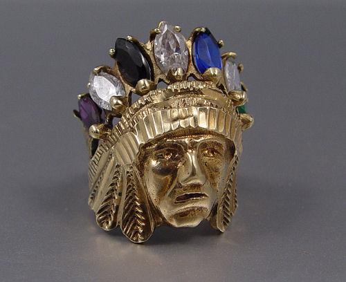 Appraisal: K INDIAN CHIEF FIGURAL RING In full headdress synthetic stones