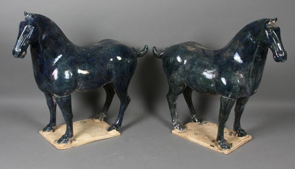 Appraisal: Pair of Chinese Tang-style glazed terra cotta horses dark blue