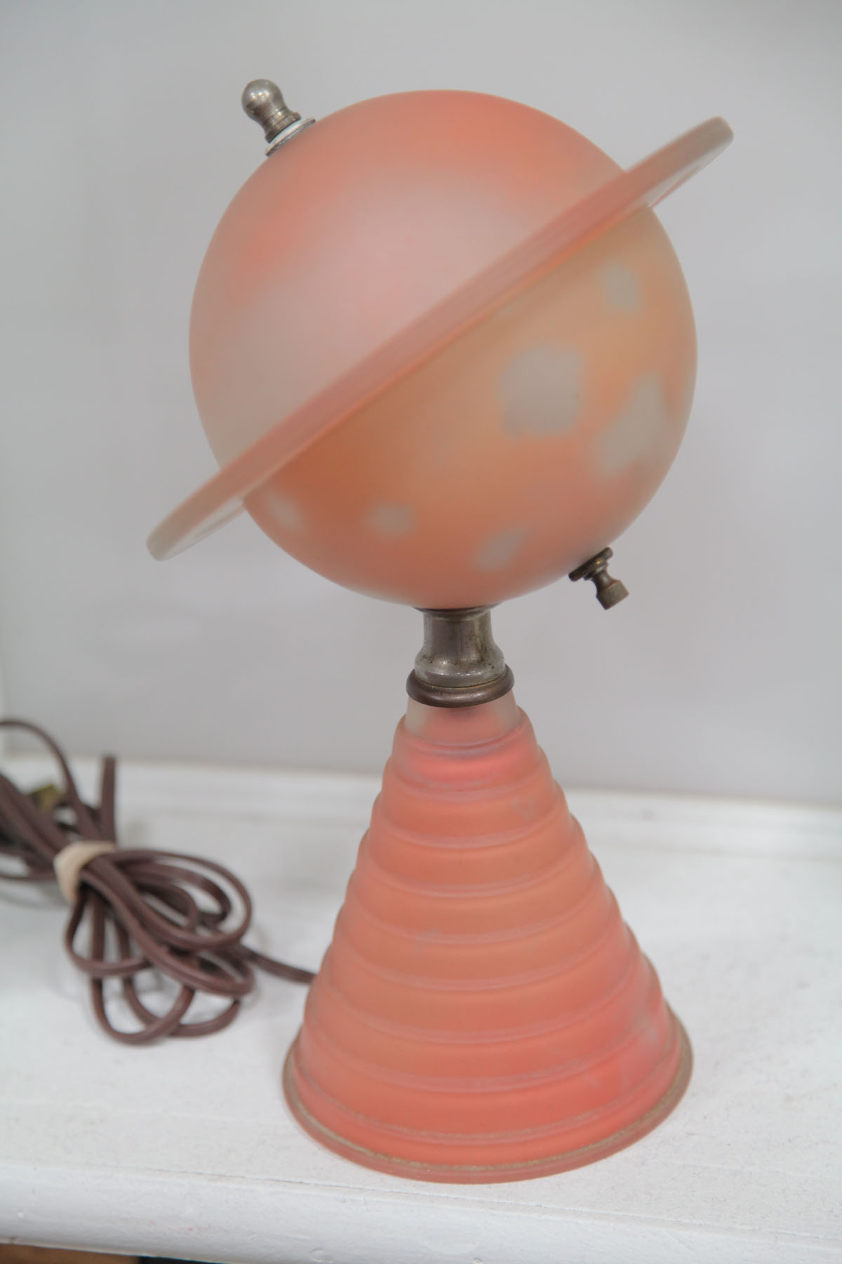 Appraisal: ART DECO SATURN TABLE LAMP American mid th century Pink