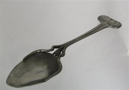 Appraisal: LIBERTY CO PRESERVE SPOON CIRCA pewter the terminal and stem