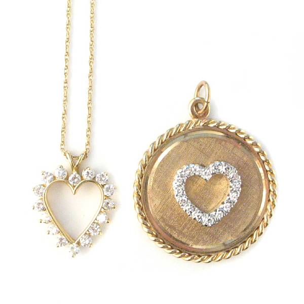 Appraisal: A collection of diamond and fourteen karat gold heart pendants