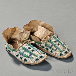 Appraisal: Pair of Cheyenne Beaded Hide Child's Moccasins c last quarter