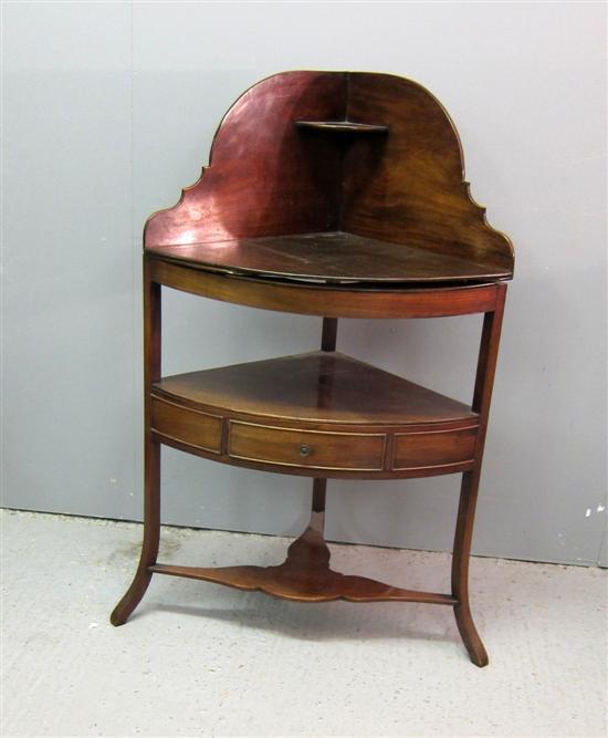 Appraisal: George III mahogany corner washstand with one drawer