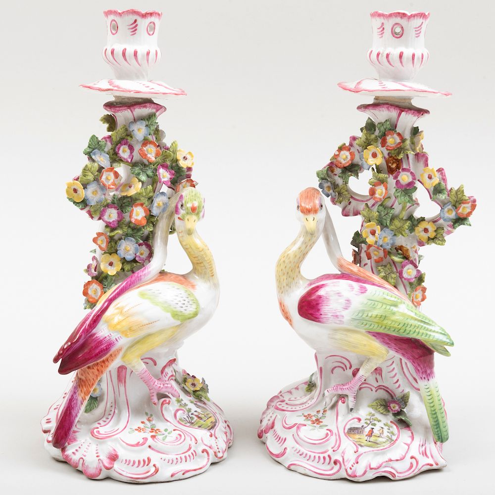 Appraisal: Pair of English Porcelain Candlesticks with Fantastical Birds Possibly Chelsea