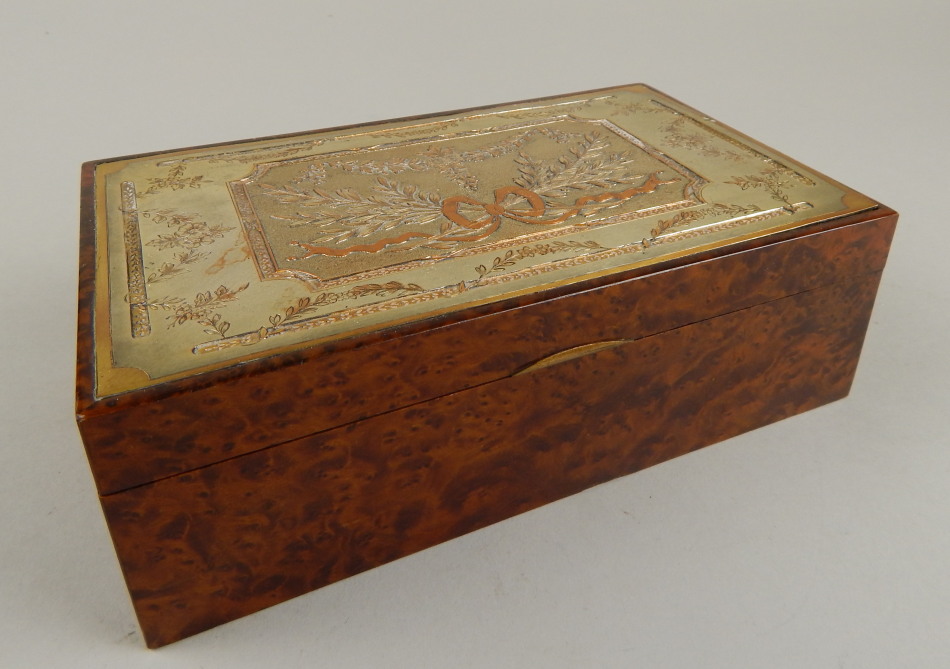 Appraisal: An early thC burr wood and metal bridge box the