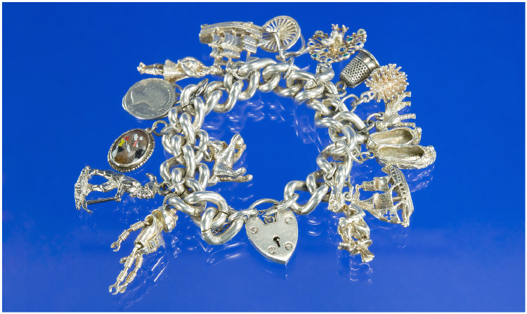 Appraisal: Silver Charm Bracelet Loaded with Charms Fully hallmarked weighs over