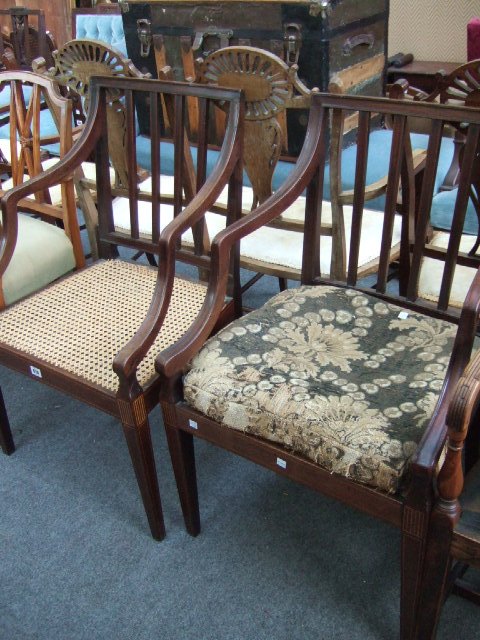 Appraisal: A pair of George III mahogany and line-inlaid dining chairs