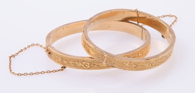 Appraisal: KY mm wide etched hinged bangles Initialed inside MCV X