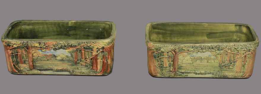 Appraisal: TWO WELLER POTTERY FOREST PATTERN PLANTERS rectangular and decorated with