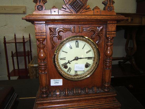 Appraisal: An American oak cased mantel clock by the Ansonia Clock