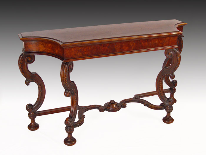 Appraisal: BERKEY GAY CARVED ENTRANCE HALL TABLE Banded burl top carved