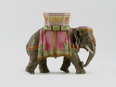 Appraisal: A Royal Worcester elephant vase the pachiderm caparisoned and supporting