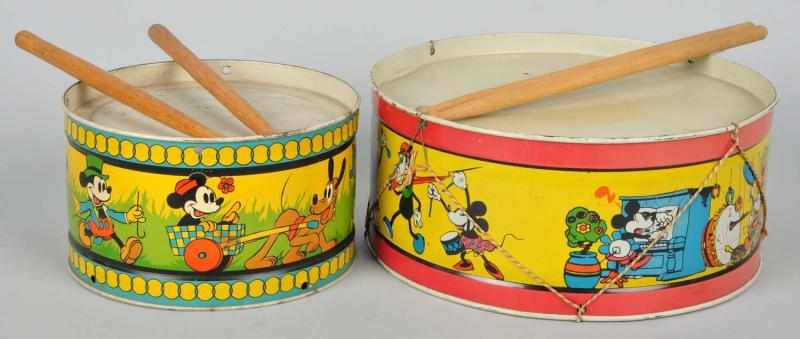 Appraisal: Lot of Tin Litho Walt Disney Drum Toys Description American