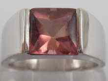 Appraisal: A white metal tests carat gold and tourmaline ring by