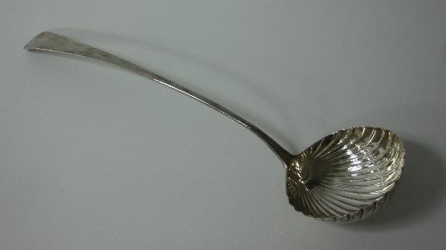 Appraisal: A George III silver soup ladle IL London with scalloped