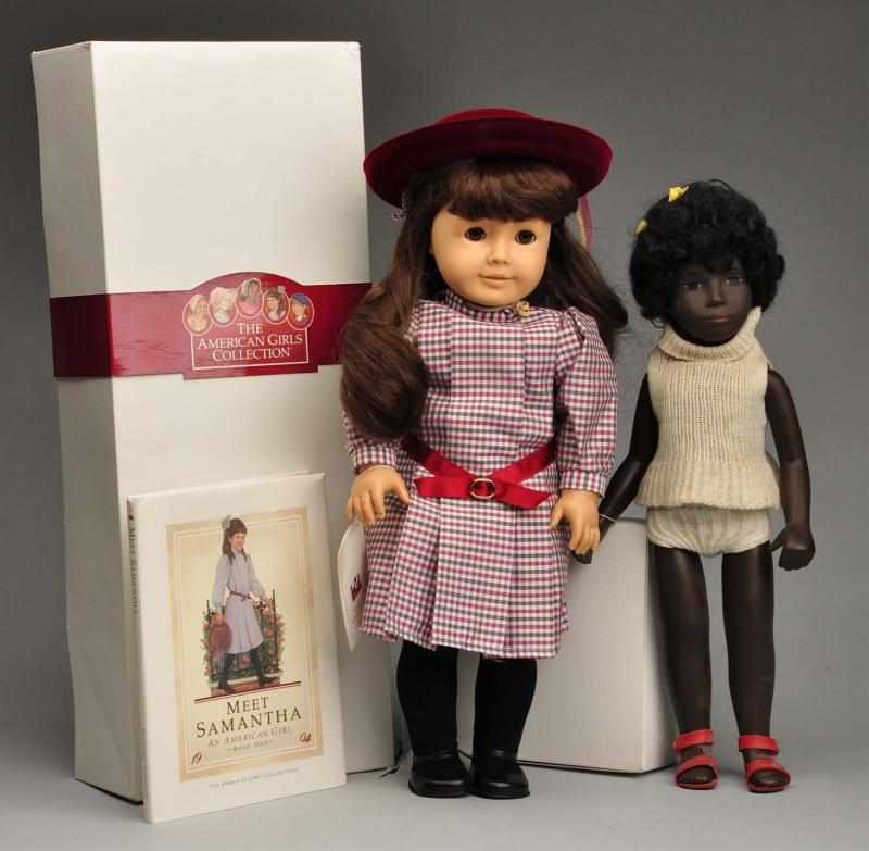 Appraisal: Lot of American Girl Sasha Doll Description Black Sasha Cora