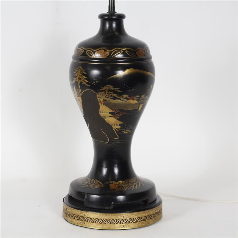 Appraisal: Painted scenic Japanese black lacquer lamp with carved stone finial