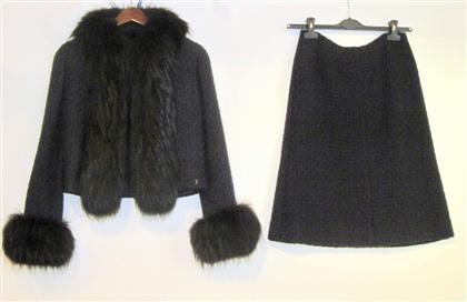 Appraisal: Navy blue and black boucle knit skirt suit ChanelSimple short