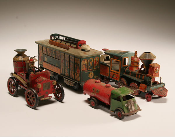 Appraisal: Four tin litho friction and wind up transportation toys Verona