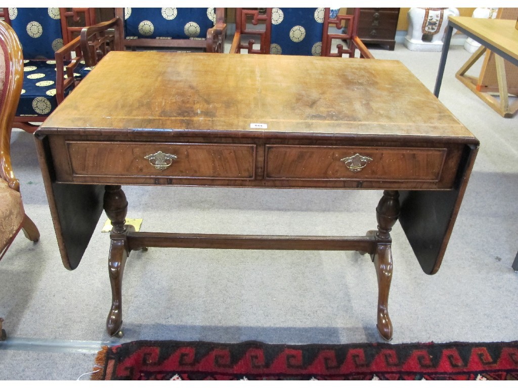 Appraisal: th century walnut inlaid sofa table