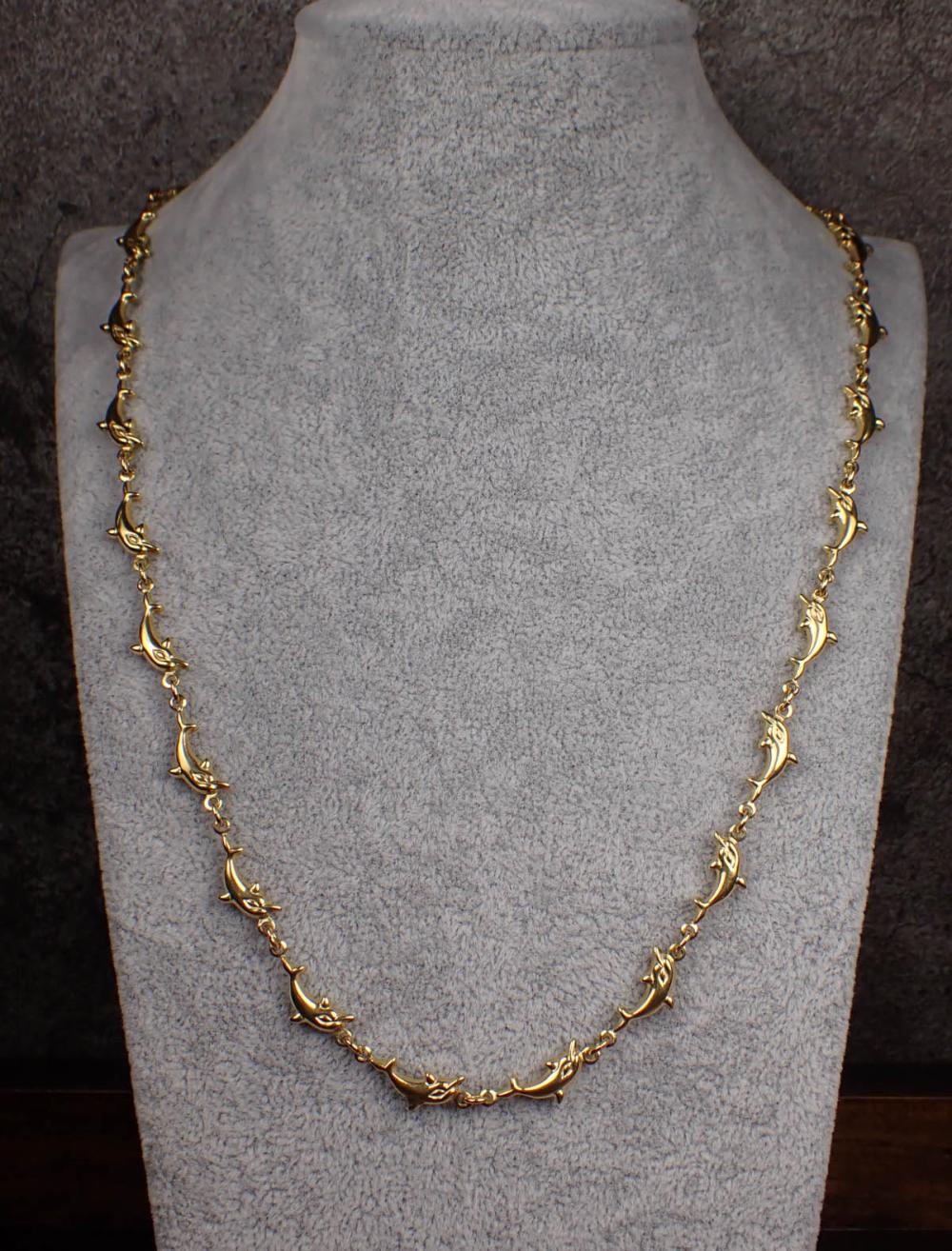 Appraisal: FOURTEEN KARAT YELLOW GOLD DOLPHIN LINK NECKLACE with yellow gold