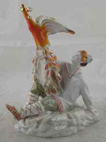 Appraisal: A Russian ceramic figure of a boy with a peacock