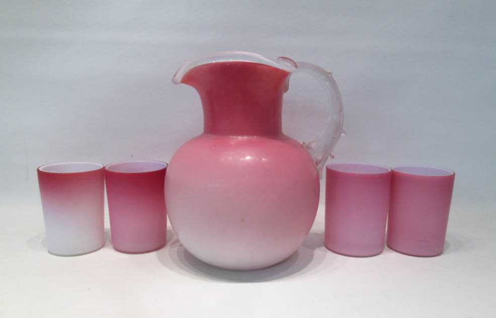 Appraisal: PEACHBLOW ART GLASS PITCHER AND TUMBLERS five pieces cased in