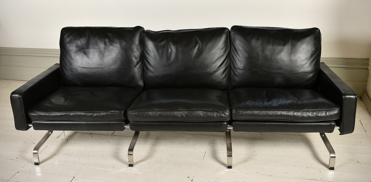 Appraisal: A CONTEMPORARY BLACK LEATHER SOFA ON A CHROME BASE h