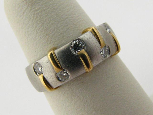 Appraisal: Lady's platinum and k yellow gold five diamond band by