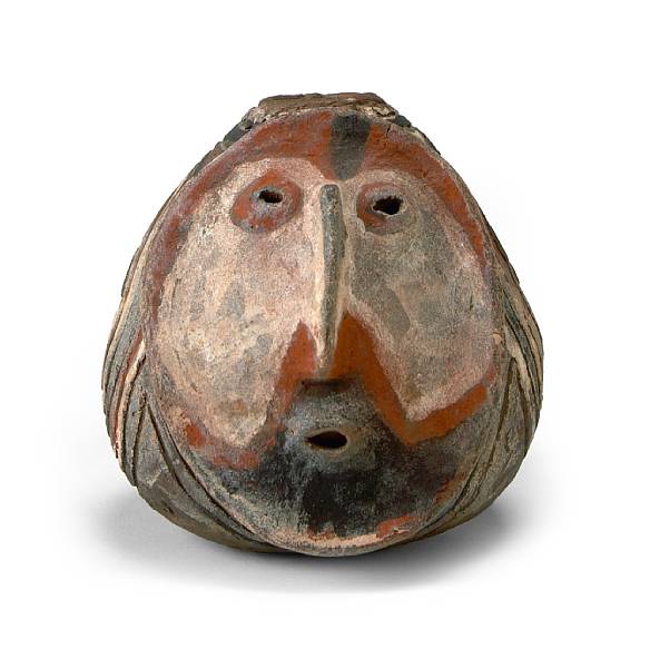 Appraisal: An Abelam painted and incised fired-clay whistle Prince Alexander Mountains