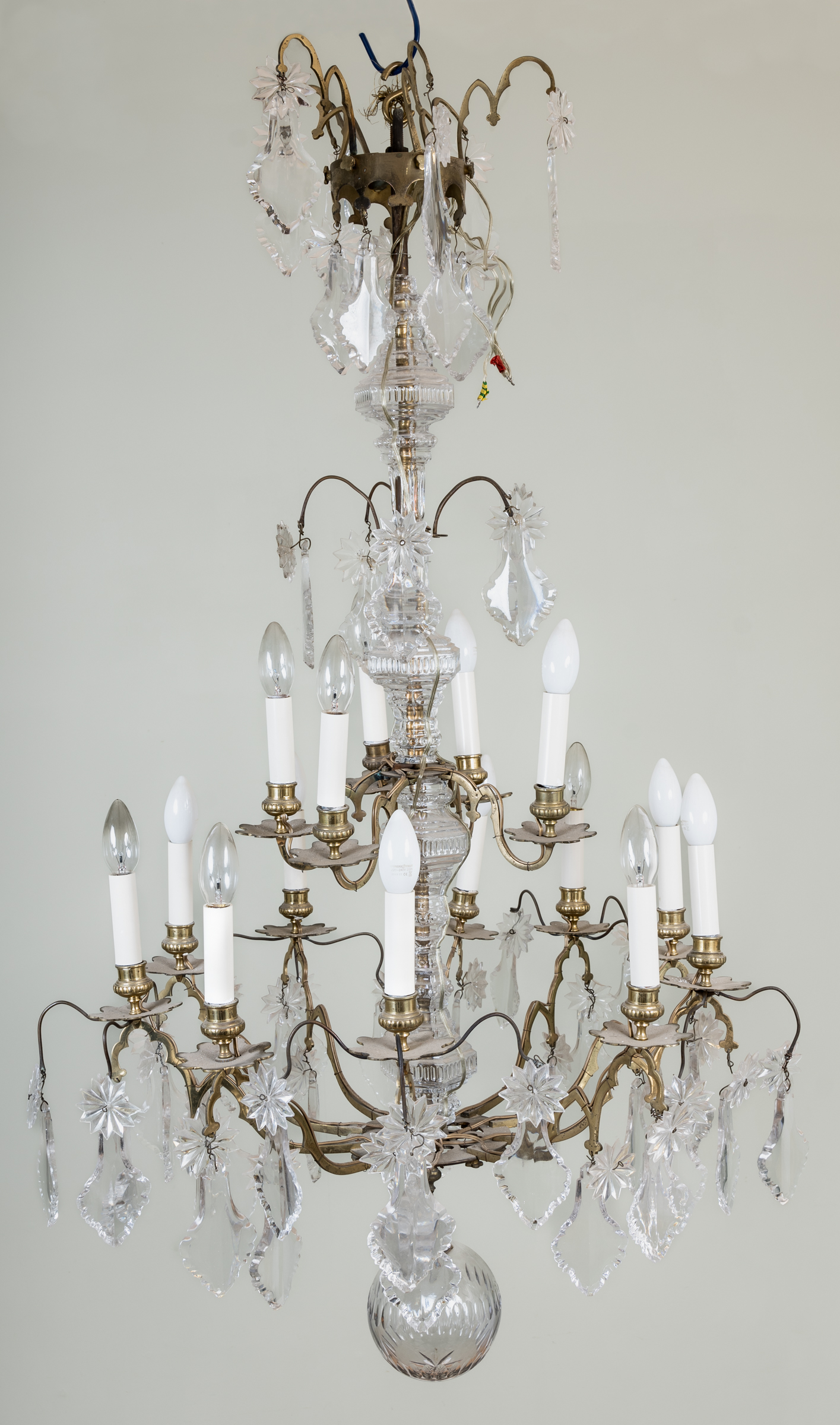 Appraisal: A two-tier twenty-light chandelier or electrolier with cut glass drops