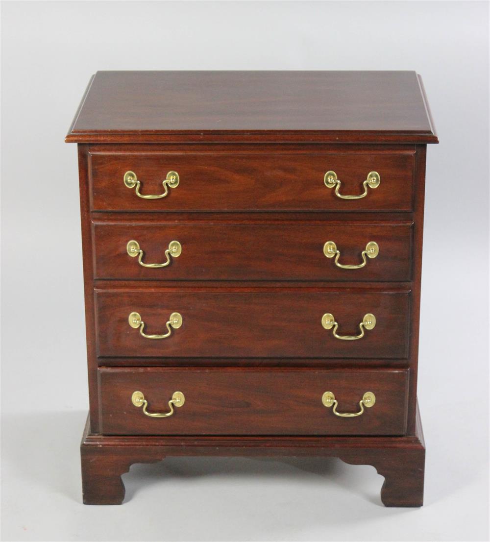 Appraisal: HENKEL HARRIS CHIPPENDALE STYLE MAHOGANY BEDSIDE CHEST the rectangular top