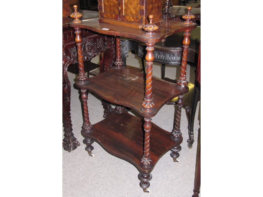 Appraisal: Victorian rosewood three-tier whatnot