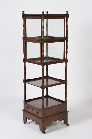 Appraisal: A REGENCY MAHOGANY FOUR TIER WHATNOT with rectangular shelves and